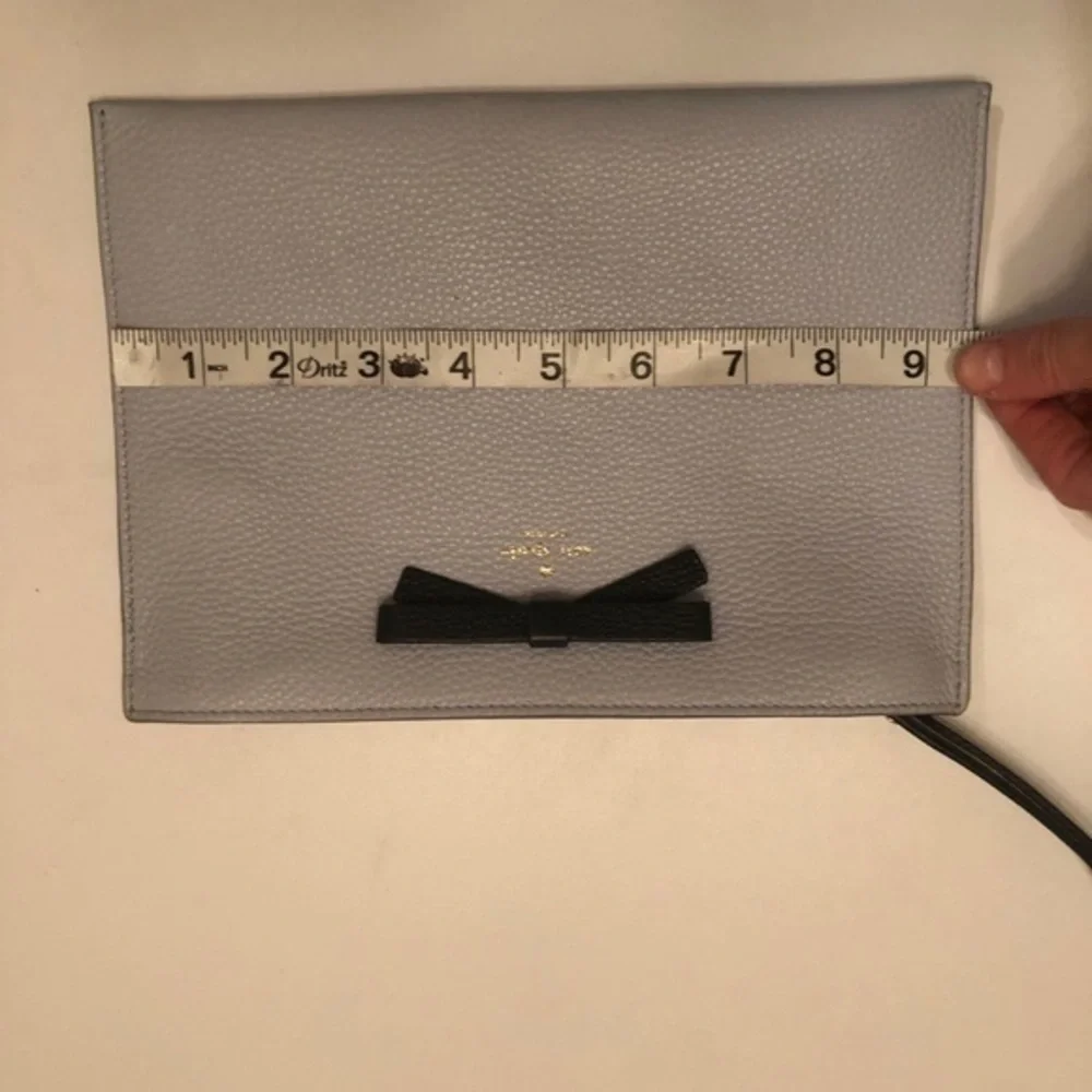 Kate spade blue leather bow large wristlet clutch